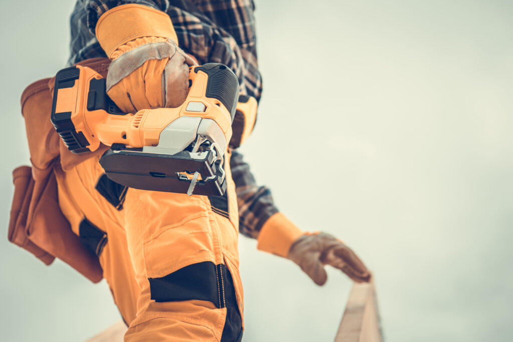 Construction Worker Holding Jigsaw On Building Sit 2026 03 24 03 46 22 Utc 1024x683